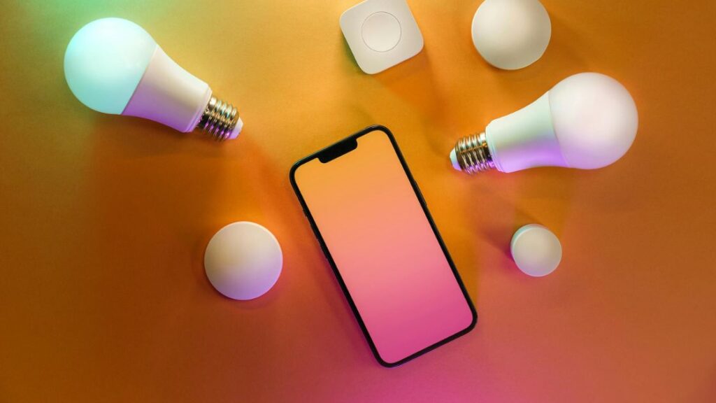 Lights bulbs in colors with a smartphone